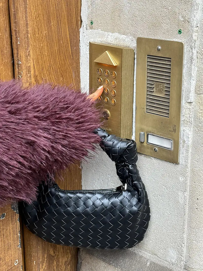 Women’s Woven Handbag With Knotted Handle And Curved Shape