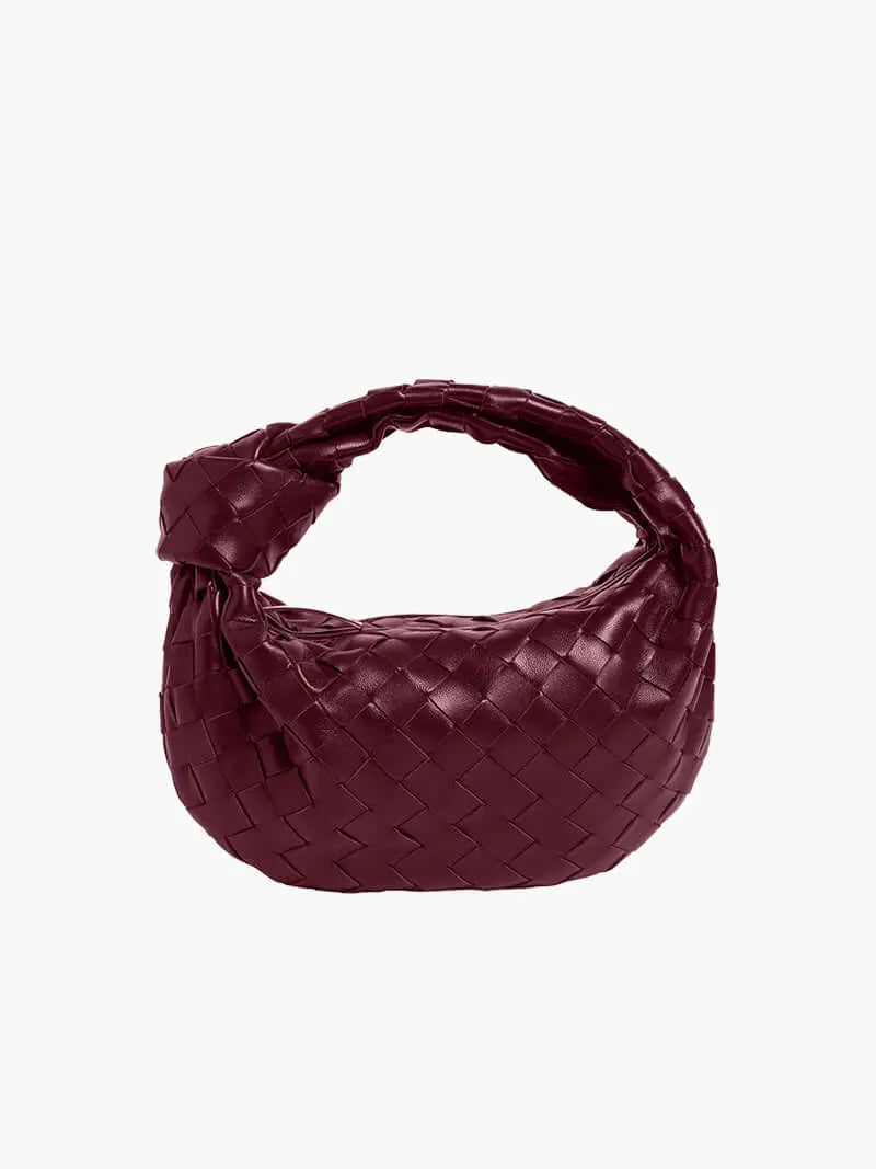 Women’s Woven Handbag With Knotted Handle And Curved Shape