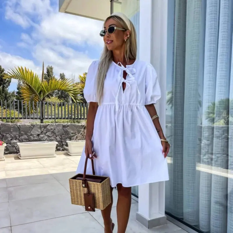 Women’s Mini Dress With Puff Sleeves And Front Bow Detail